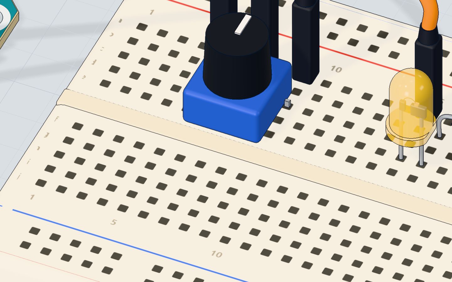Close-up of the potentiometer's three legs in the breadboard