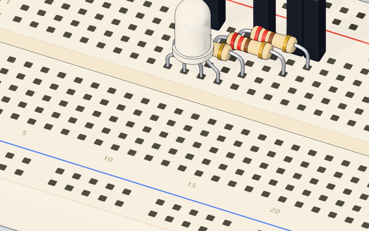 Close-up of the RGB LED's four legs and its three resistors