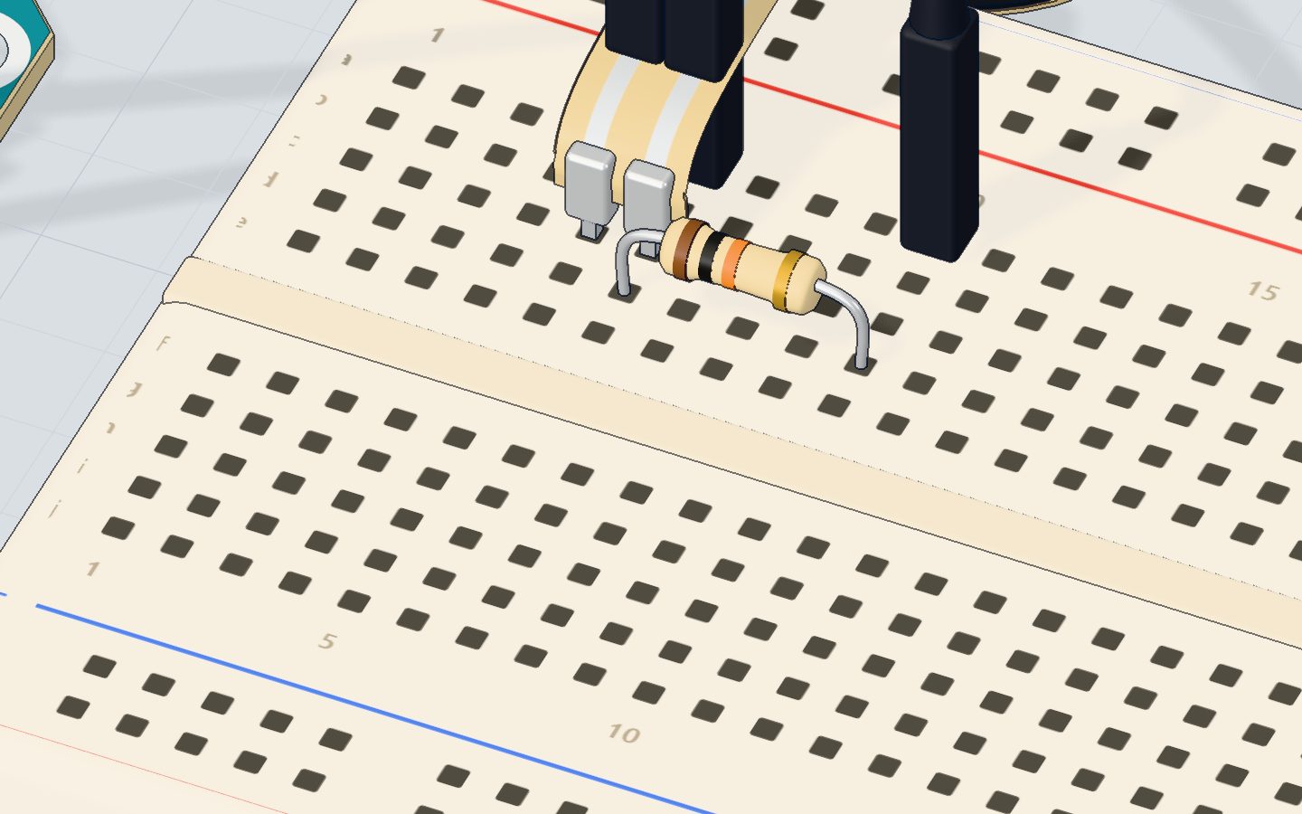 Close-up of the round FSR pad, the 10 kΩ resistor and the buzzer on the breadboard