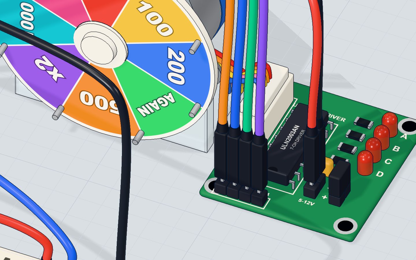 Close-up of the 28BYJ-48 stepper motor and its ULN2003 driver board with the LEDs A to D